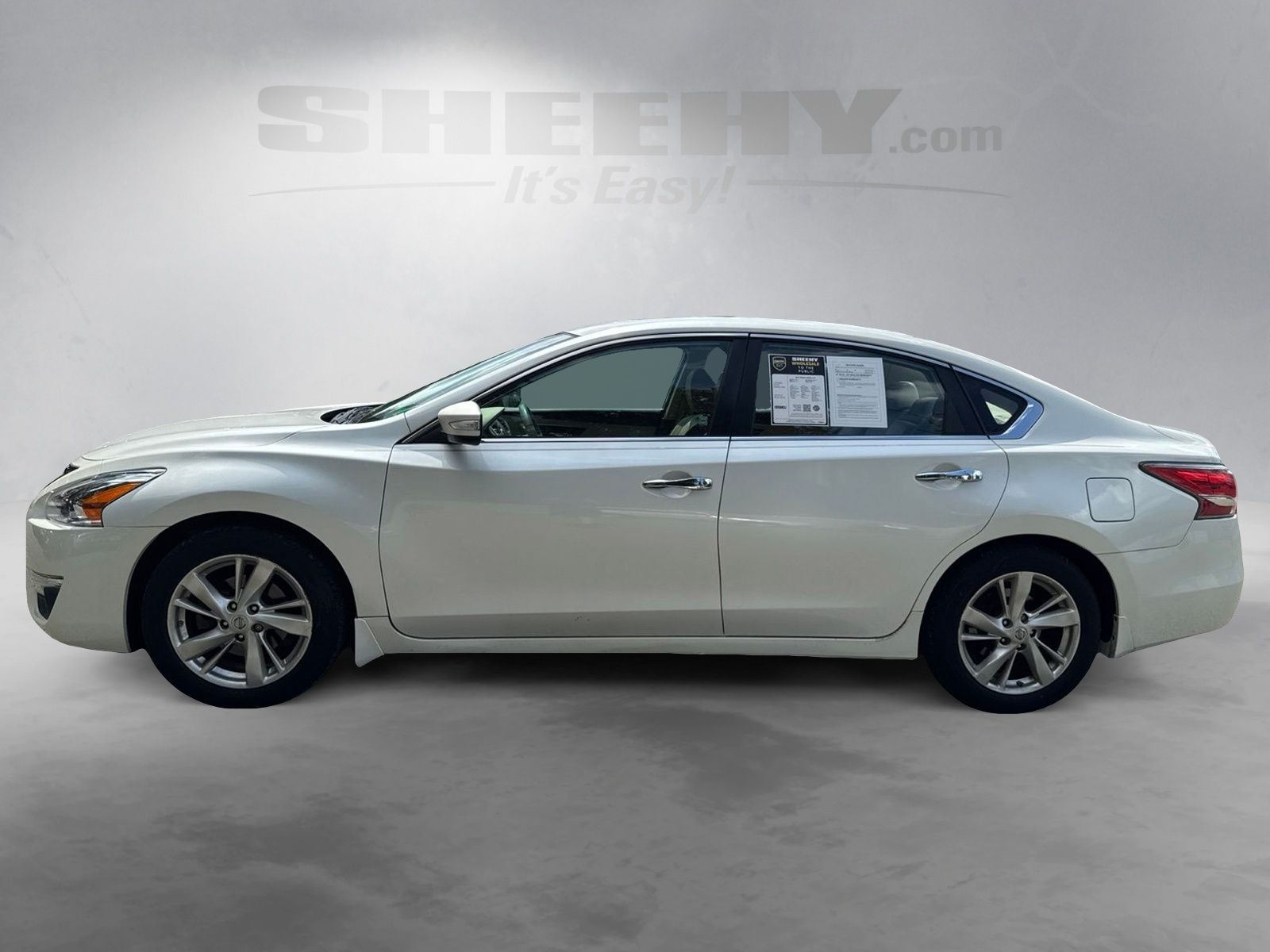 Used 2015 Pearl White Nissan 2.5 SL image 14