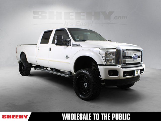 White Platinum Clearcoat Metallic 2014 Ford F-350 Super Duty Platinum Crew Cab 4WD Pickup Truck Four-Wheel Drive 6-Speed Automatic Overdrive