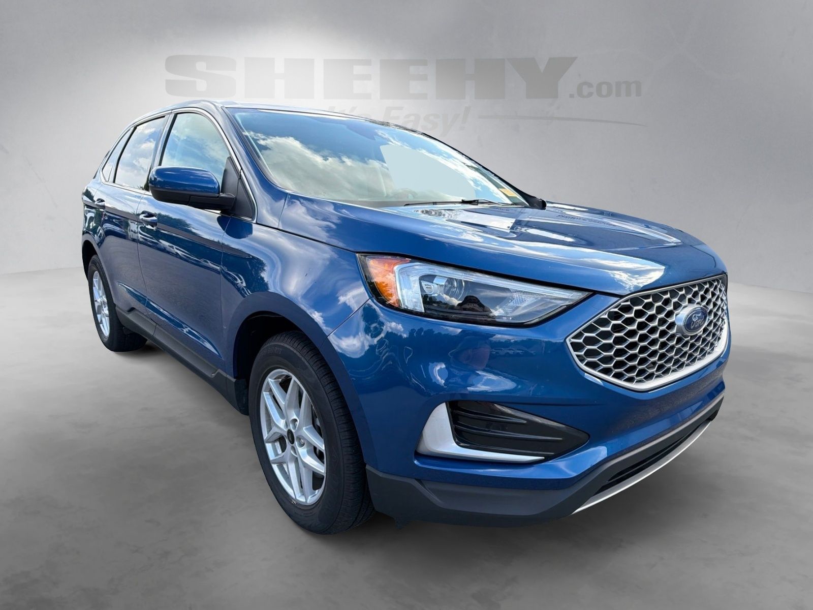 Certified Used 2024 Atlas Blue Metallic Ford SEL image 2