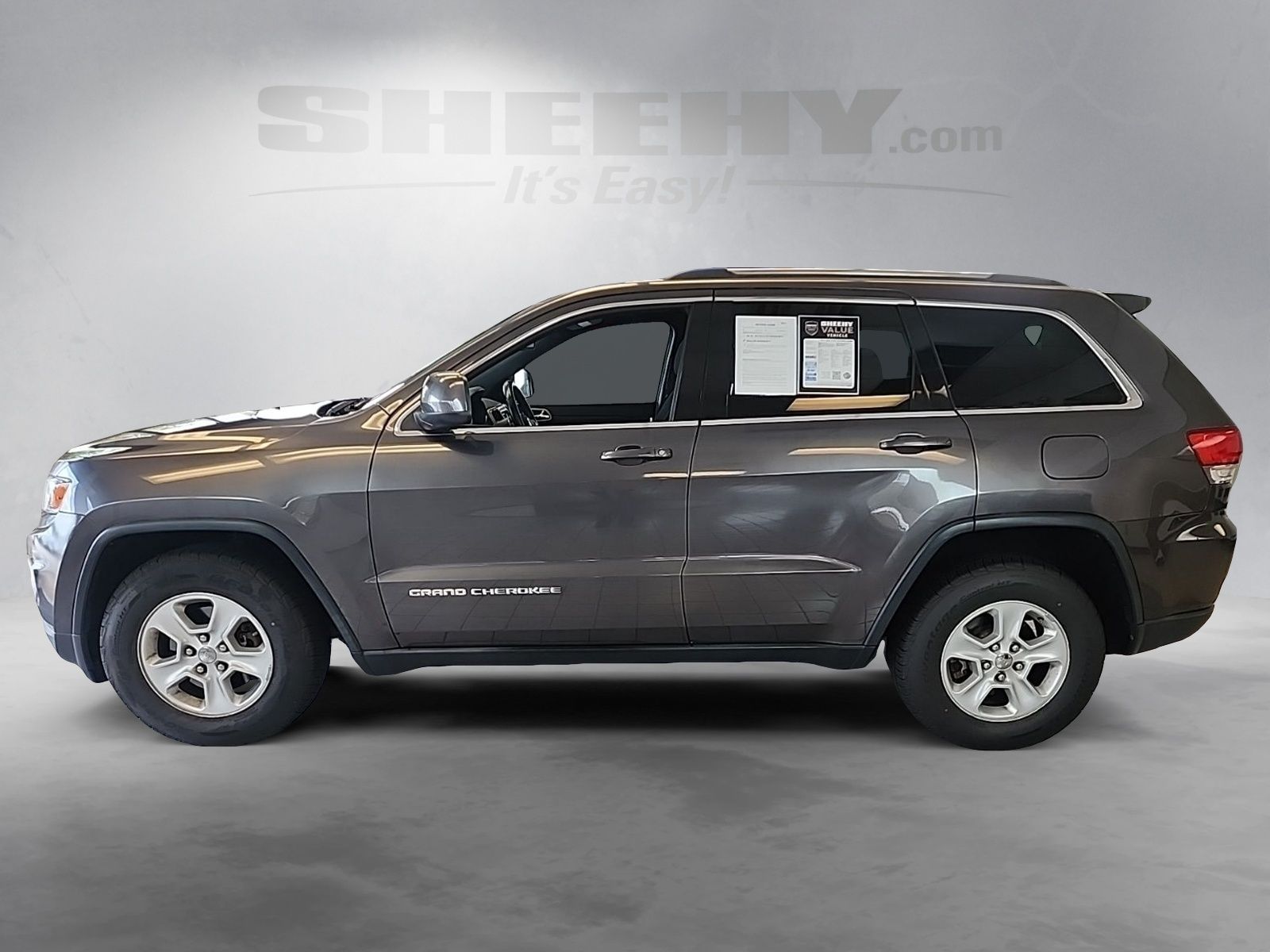 Used 2014 Granite Crystal Clearcoat Metallic Jeep Laredo image 16