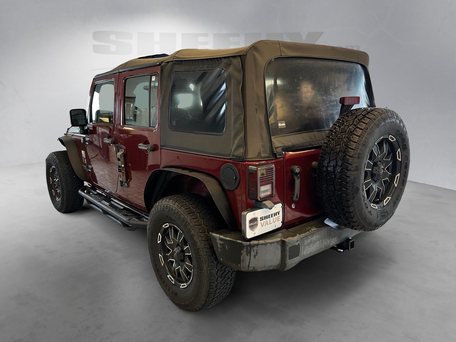 Used 2007 Red Rock Crystal Pearlcoat Jeep Unlimited X image 12