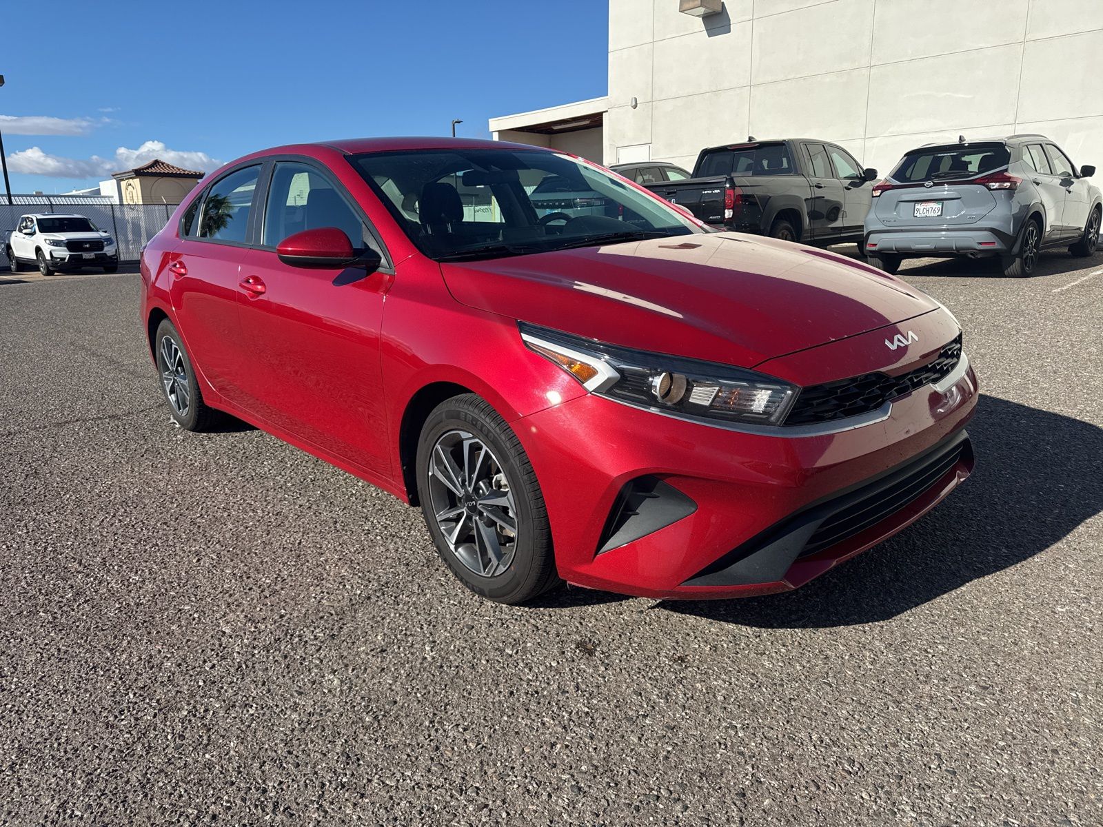 Currant Red 2024 Kia Forte LXS FWD Sedan Front-Wheel Drive Continuously Variable Transmission