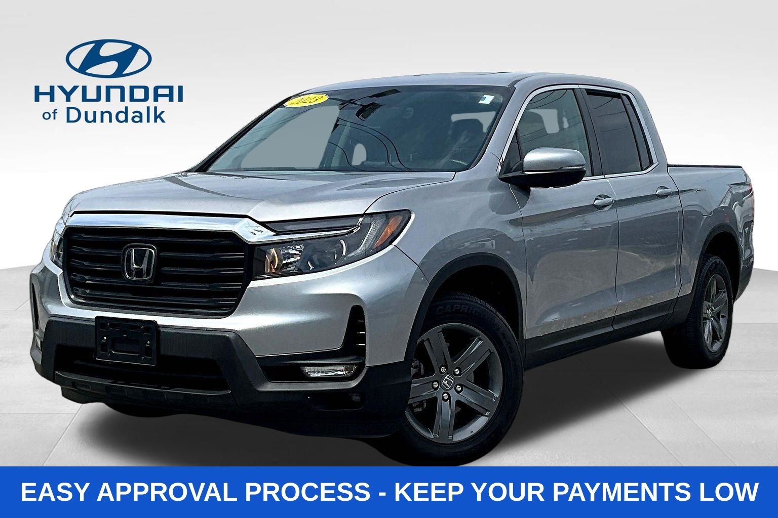 Silver 2023 Honda Ridgeline Pickup Truck All-Wheel Drive 9-Speed Automatic