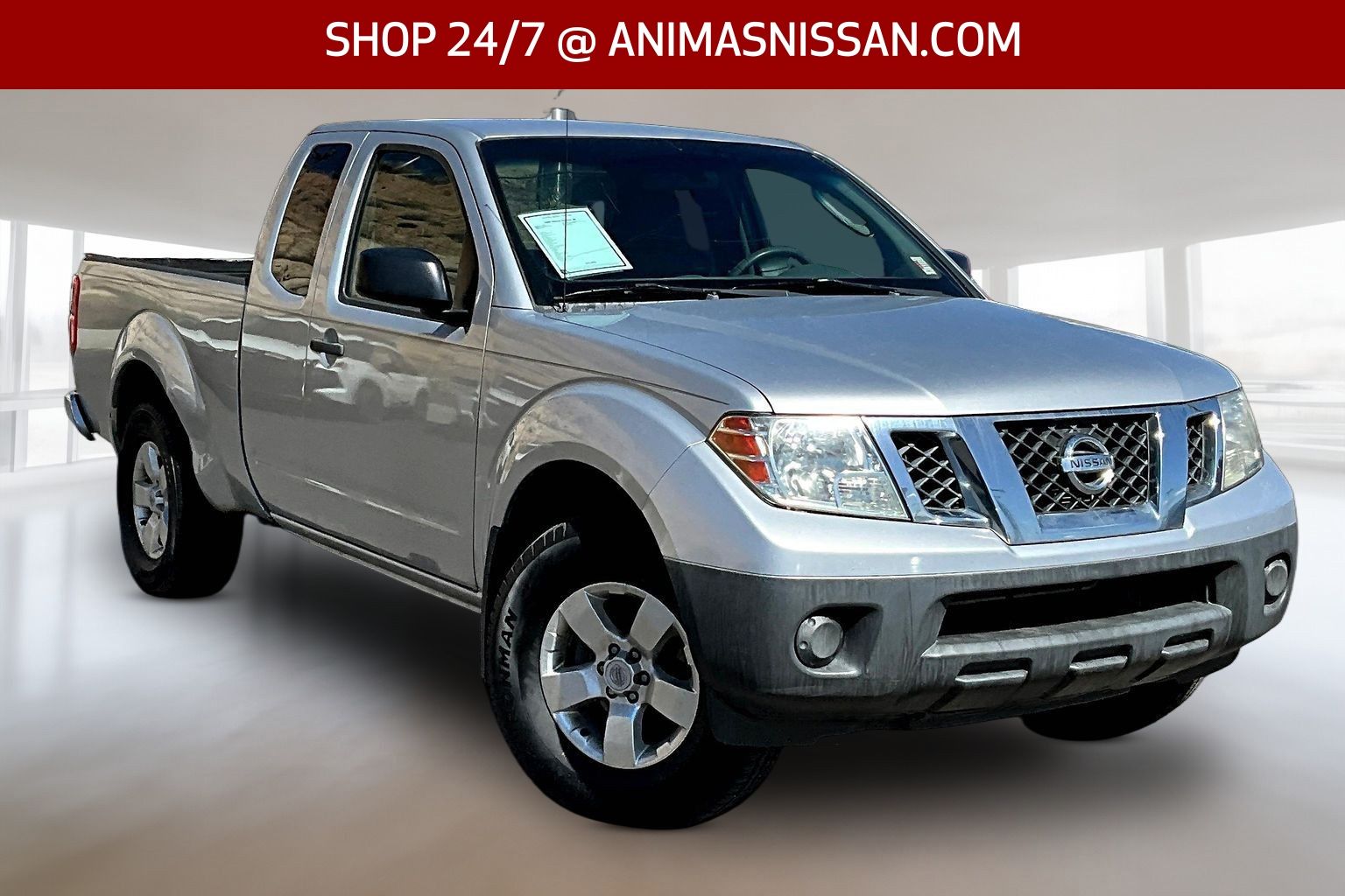 Silver Lightning Metallic 2009 Nissan Frontier XE King Cab Pickup Truck 4X2 5-Speed Manual Overdrive