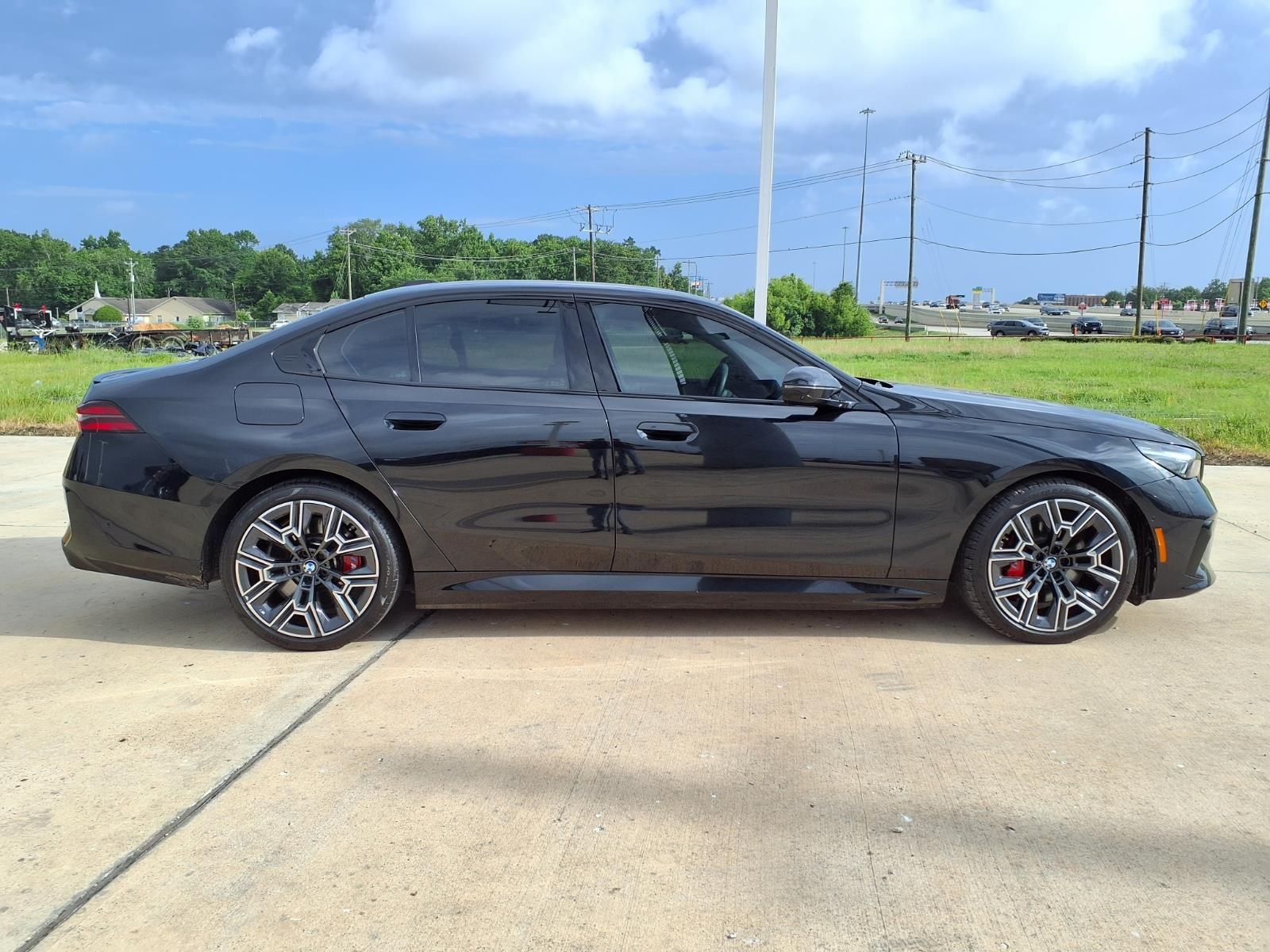 2026 BMW 5 Series 550e xDrive Black at Central Houston Nissan