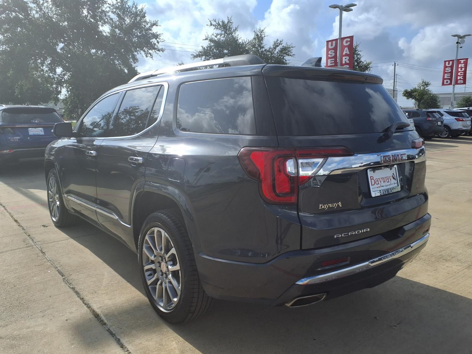 2022 GMC Acadia Denali Green at AutoSavvy Houston Southwest