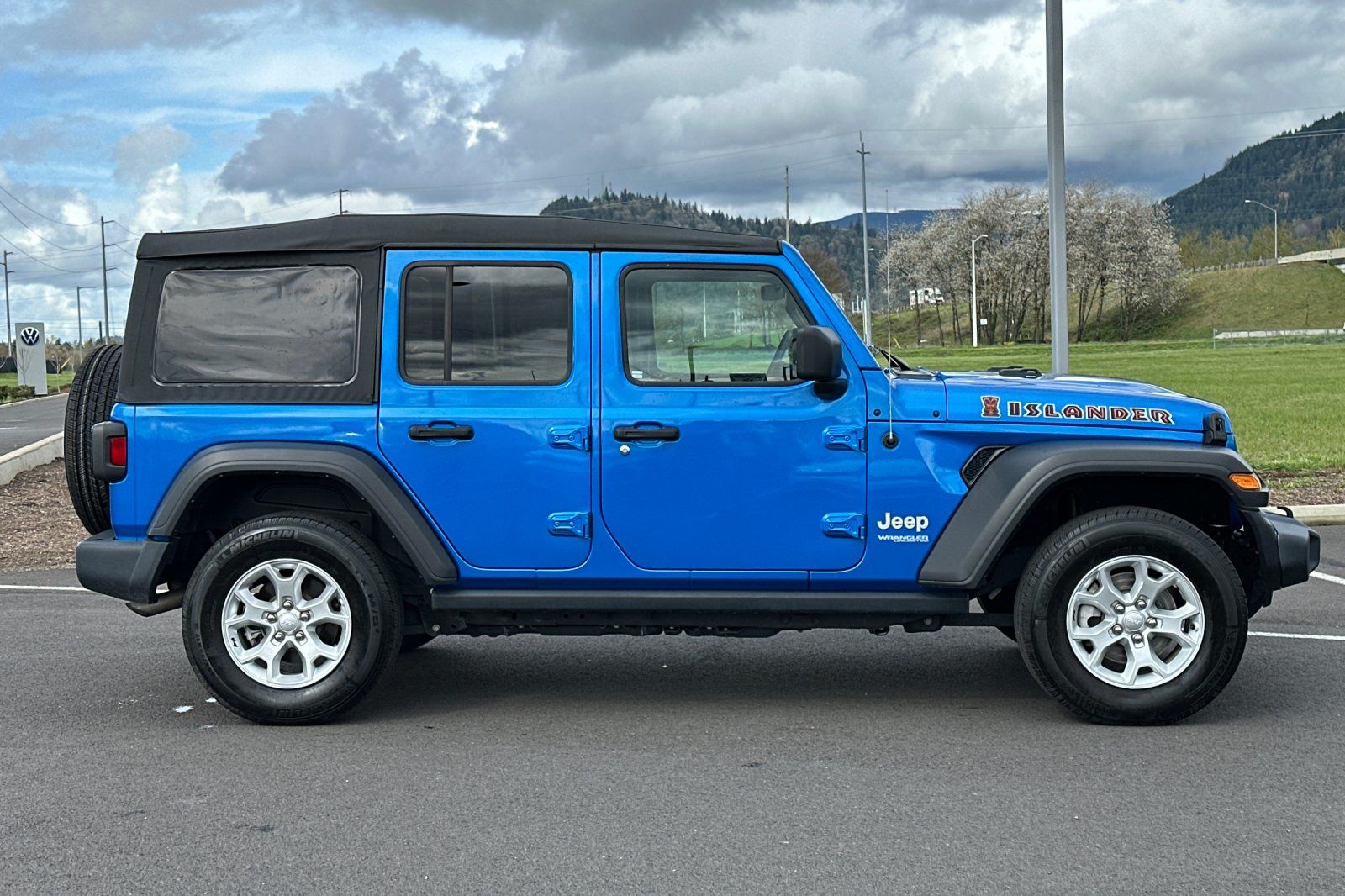 Used 2021 Jeep Wrangler Unlimited ISLANDER with VIN 1C4HJXDN7MW717853 for sale in Eugene, OR