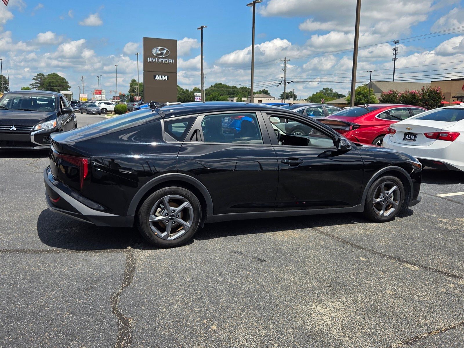 Used 2025 Black Kia LXS image 13