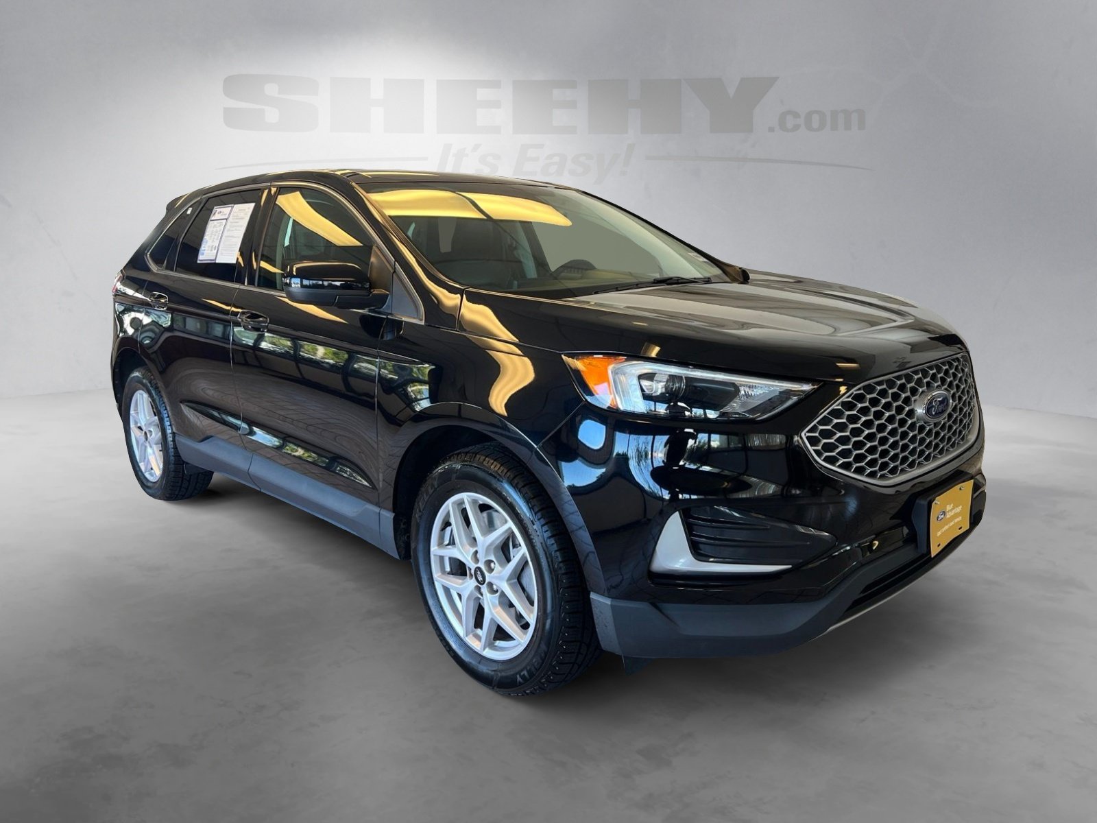 Certified Used 2024 Agate Black Metallic Ford SEL image 2