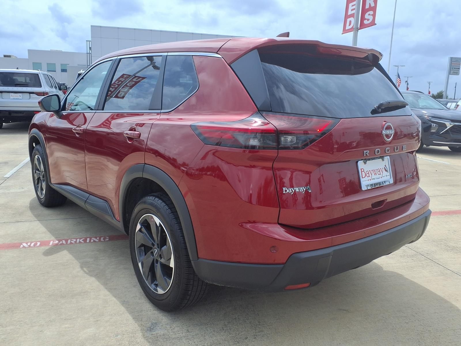 2025 Nissan Rogue SV Red at Central Houston Nissan