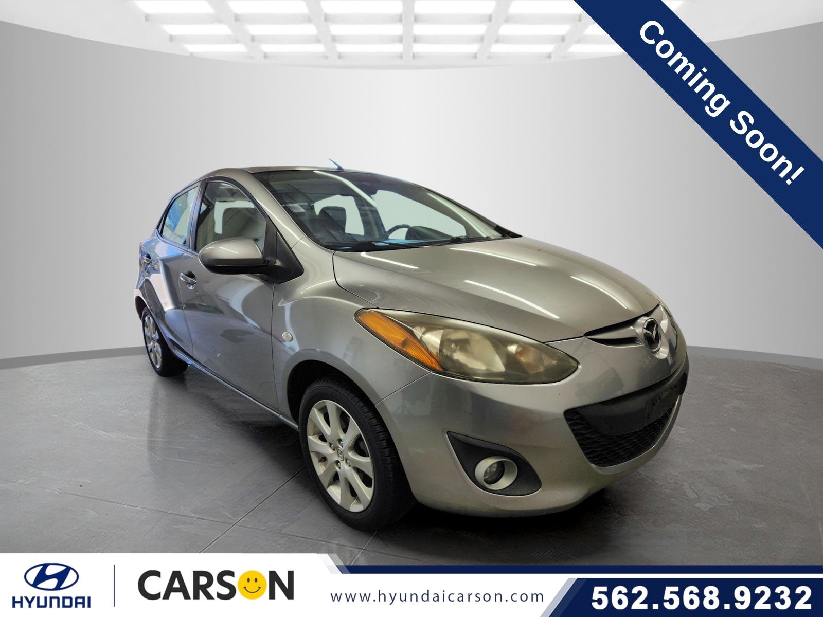 Liquid Silver Metallic 2011 Mazda MAZDA2 Touring Hatchback Front-Wheel Drive 4-Speed Automatic