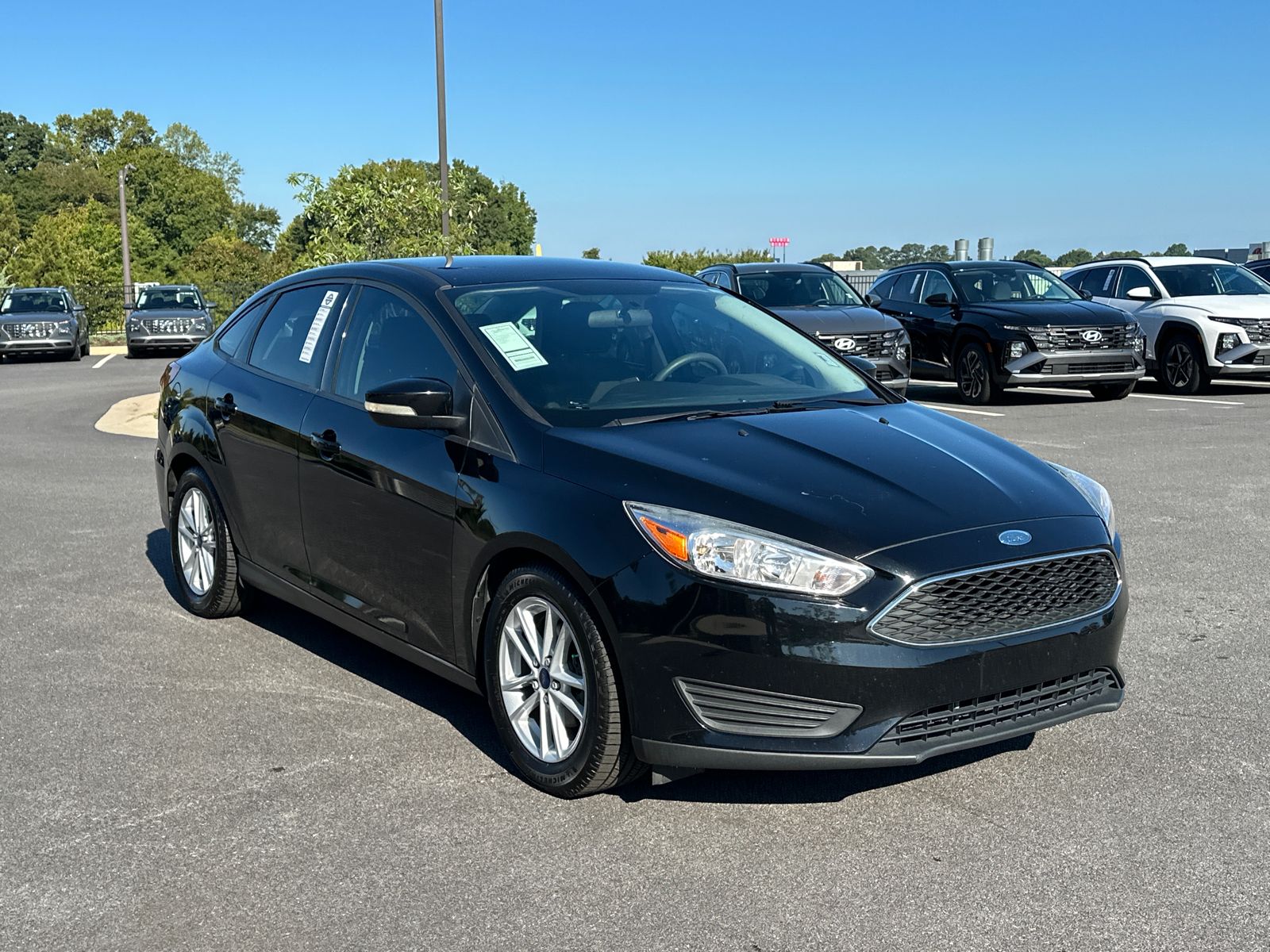 Shadow Black 2017 Ford Focus Sedan Front-Wheel Drive 6-Speed Automatic