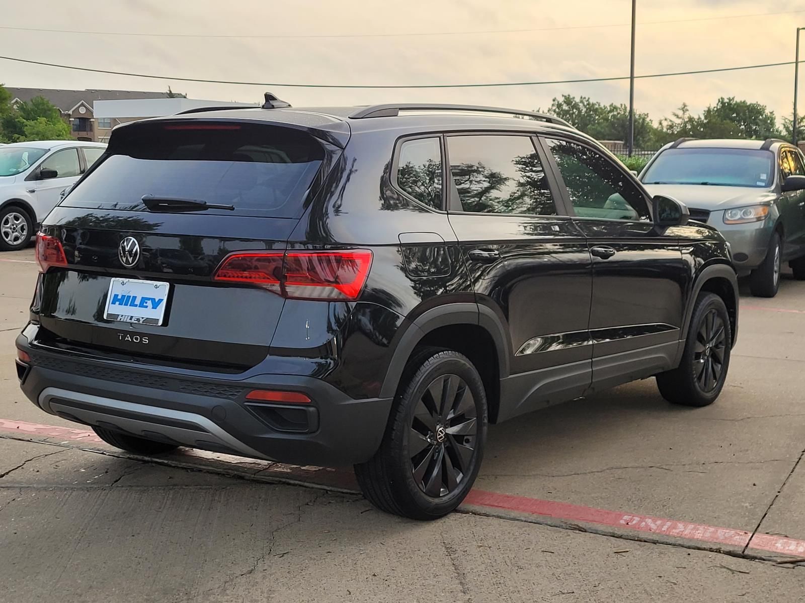 used 2023 Volkswagen Taos car, priced at $18,500