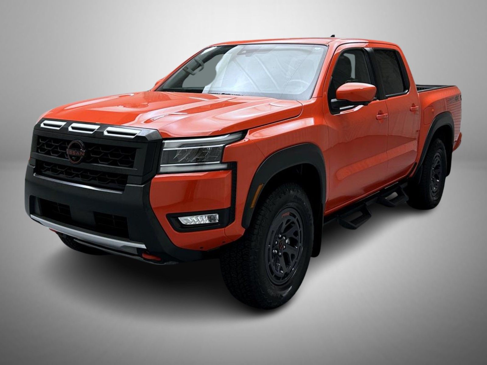 Afterburn Orange 2025 Nissan Frontier Pickup Truck Four-Wheel Drive 9-Speed Automatic Overdrive