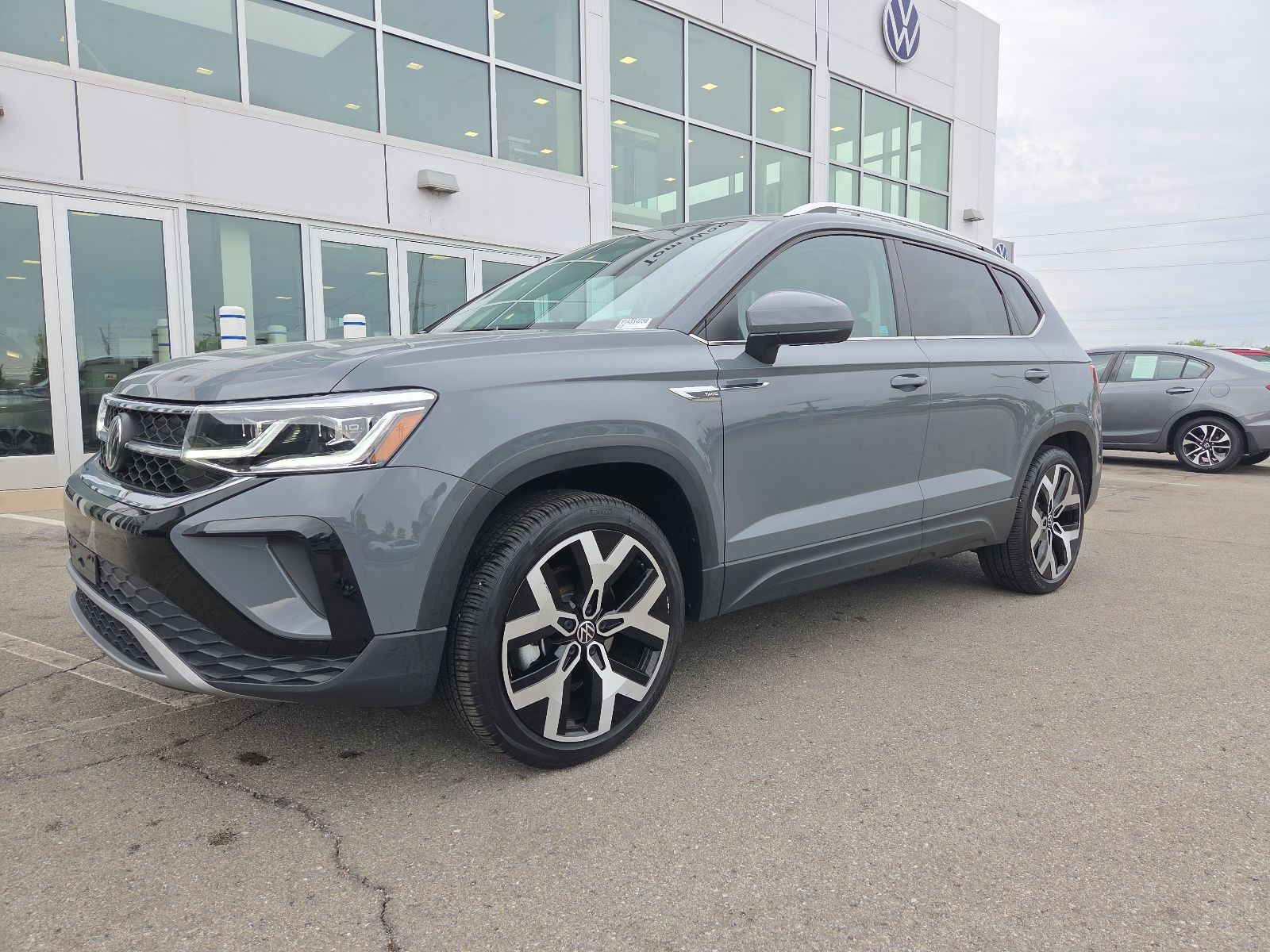 used 2023 Volkswagen Taos car, priced at $23,547