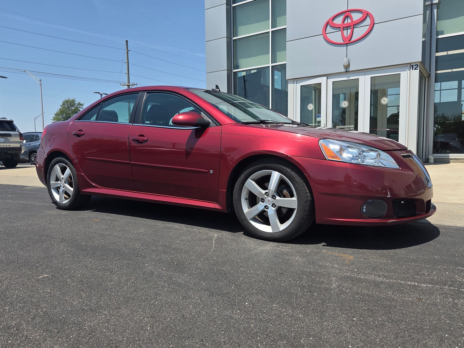 Performance Red Metallic 2009 Pontiac G6 GT Sedan Front-Wheel Drive 4-Speed Automatic Overdrive