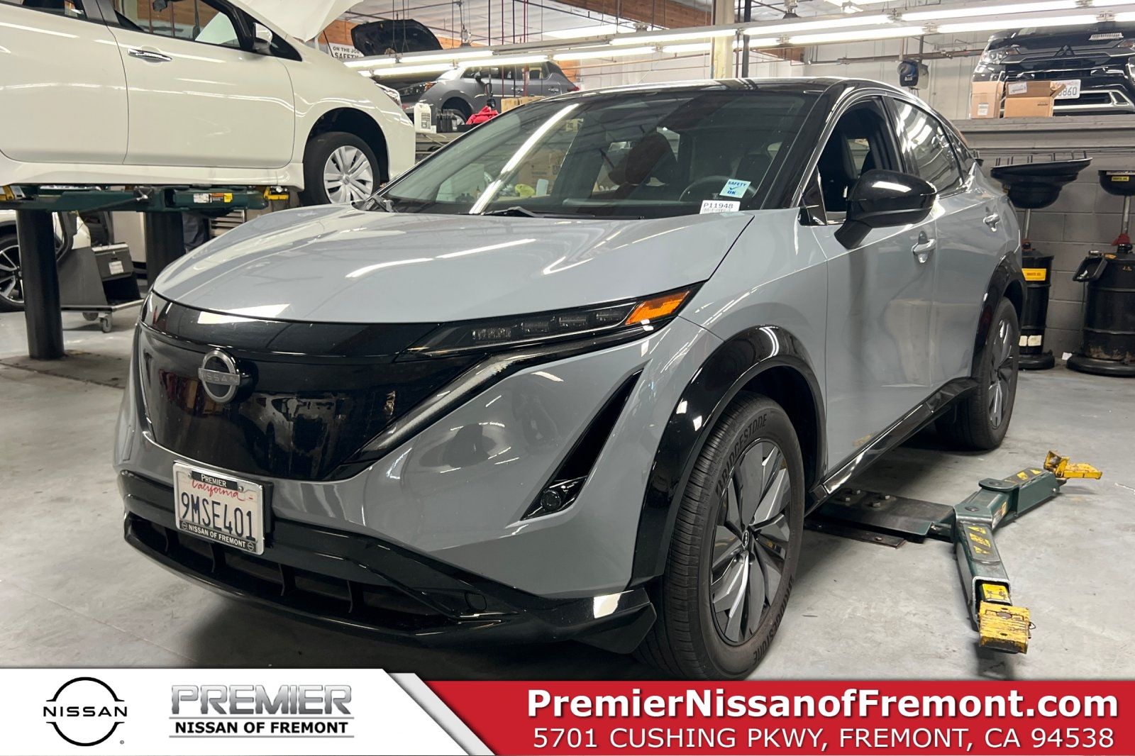 Boulder Gray Pearl/Black Diamond Pearl 2024 Nissan Ariya Engage e-4ORCE SUV / Crossover All-Wheel Drive Continuously Variable Transmission