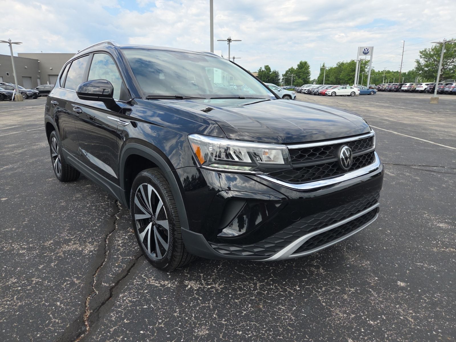 used 2023 Volkswagen Taos car, priced at $24,150