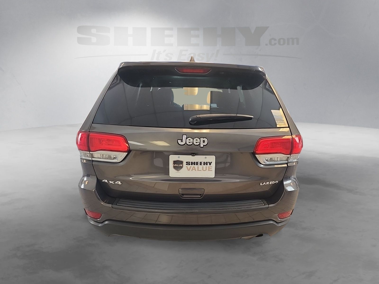 Used 2014 Granite Crystal Clearcoat Metallic Jeep Laredo image 13