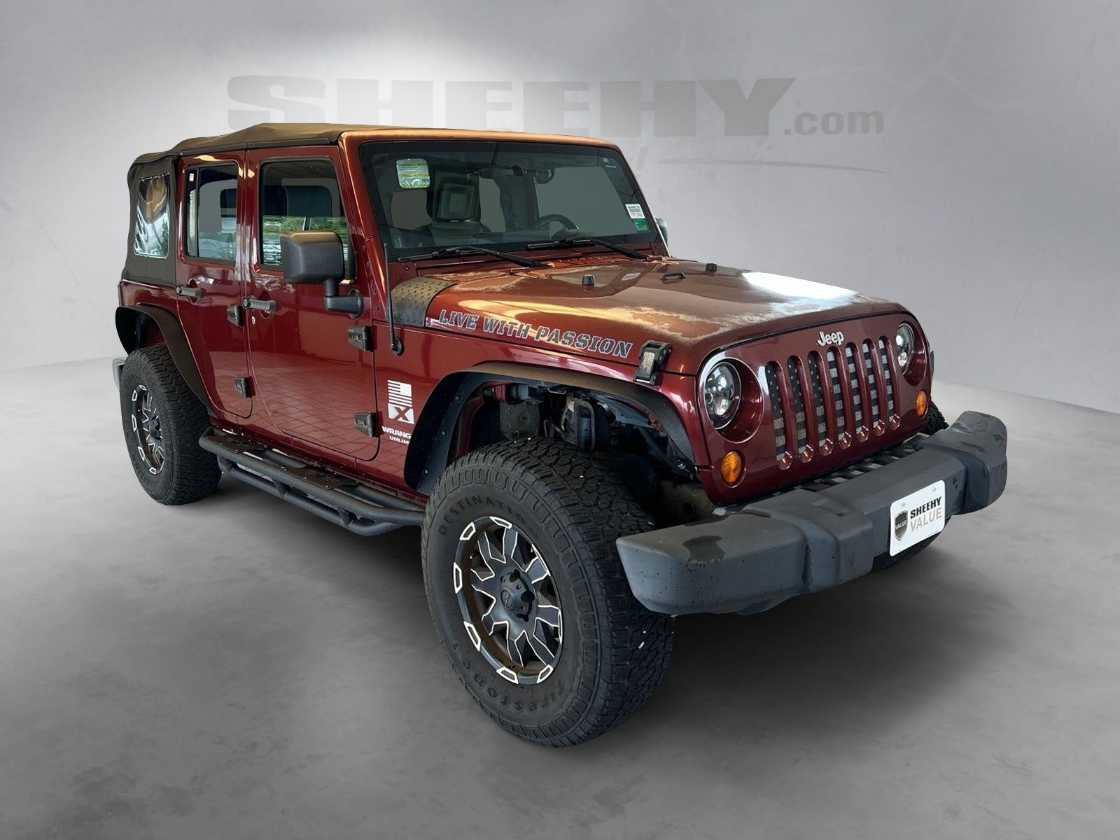 Used 2007 Red Rock Crystal Pearlcoat Jeep Unlimited X image 14