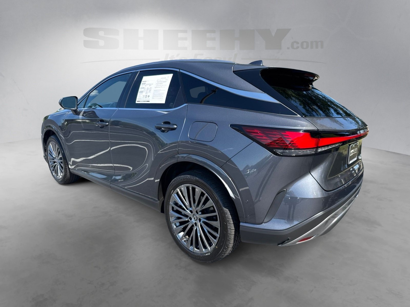 Used 2025 Gray Lexus 450h+ Luxury image 13