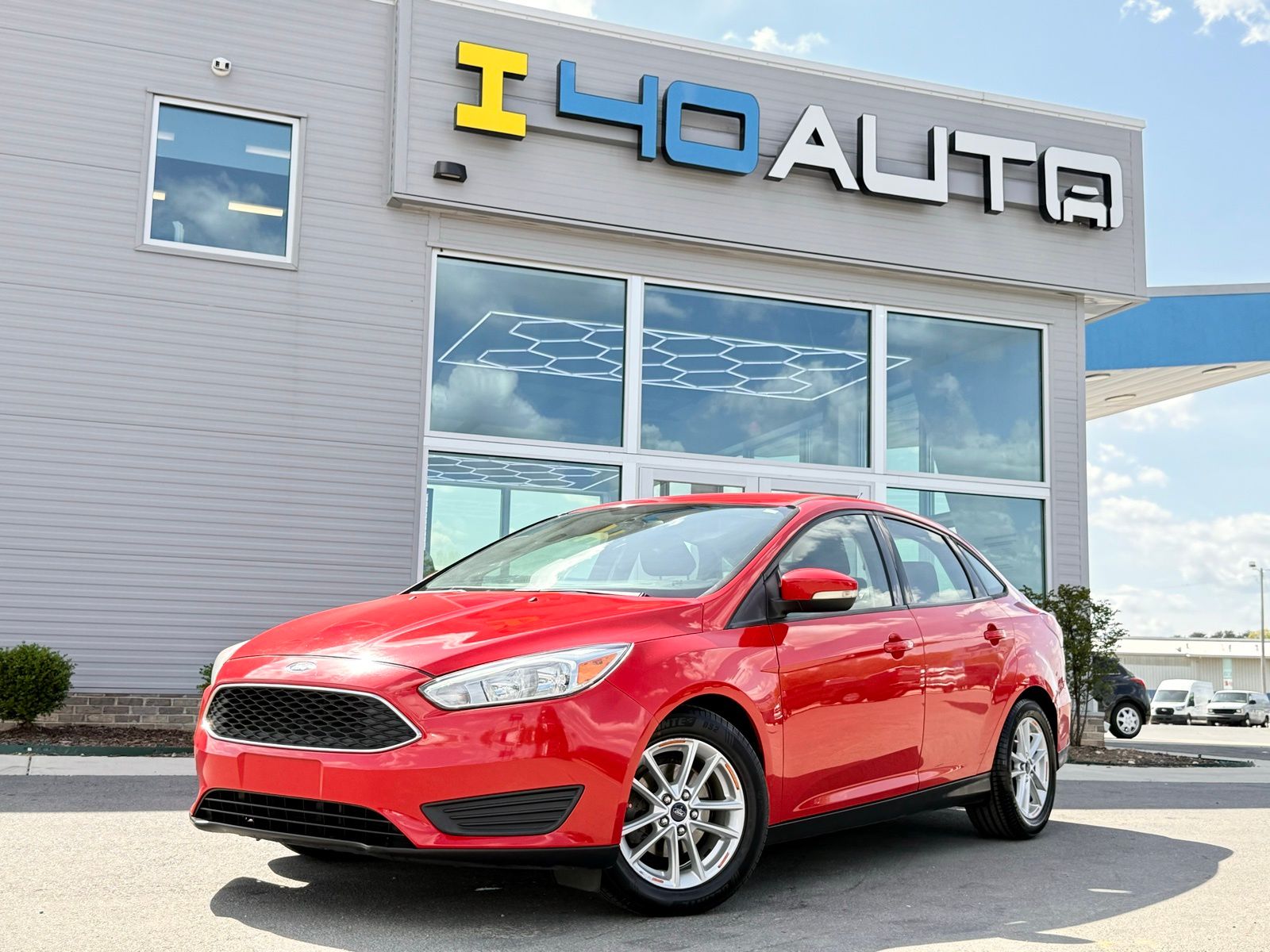 Race Red 2015 Ford Focus SE Sedan Front-Wheel Drive 6-Speed Automatic