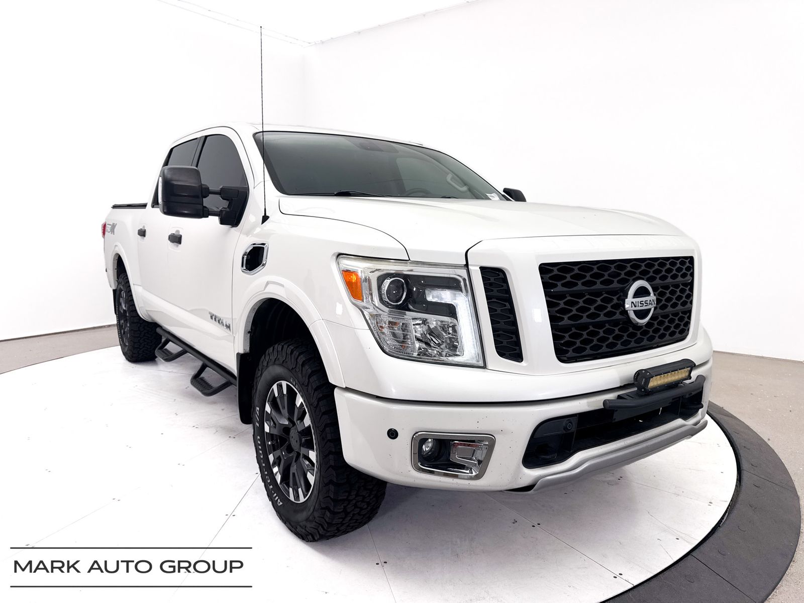 Pearl White 2017 Nissan Titan Pickup Truck Four-Wheel Drive 7-Speed Automatic