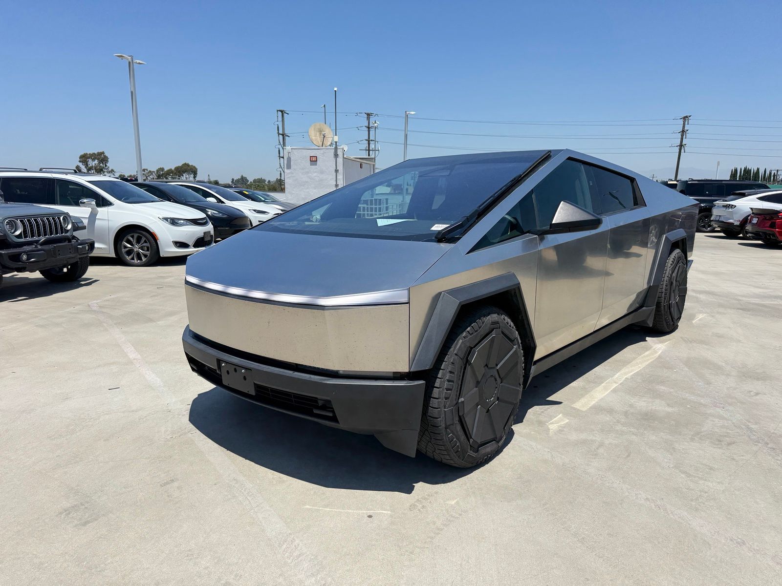 Silver 2024 Tesla Cybertruck Crew Cab AWD Pickup Truck All-Wheel Drive 1-Speed Automatic