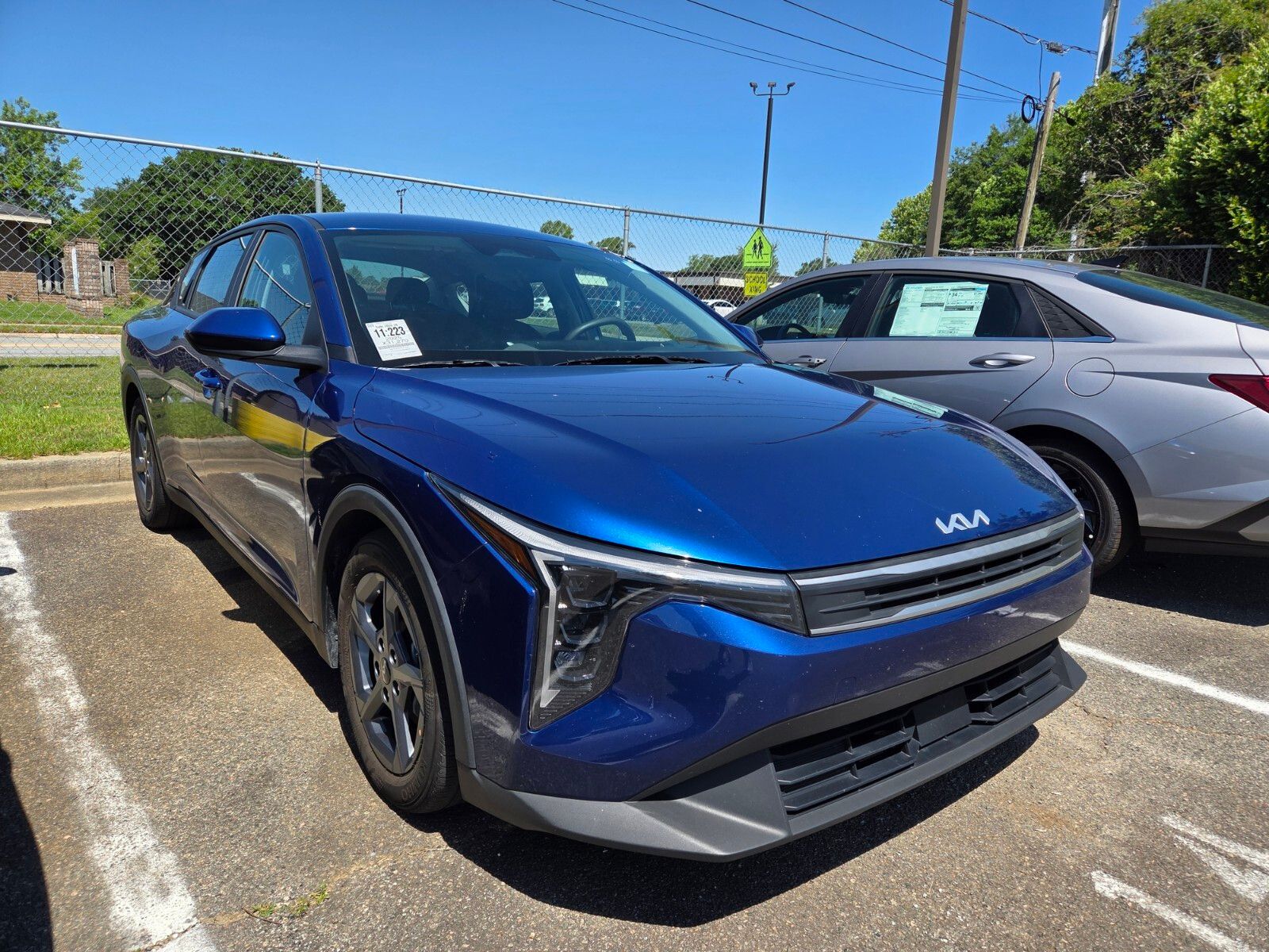 Deep Sea Blue 2025 Kia K4 LXS FWD Sedan Front-Wheel Drive Continuously Variable Transmission