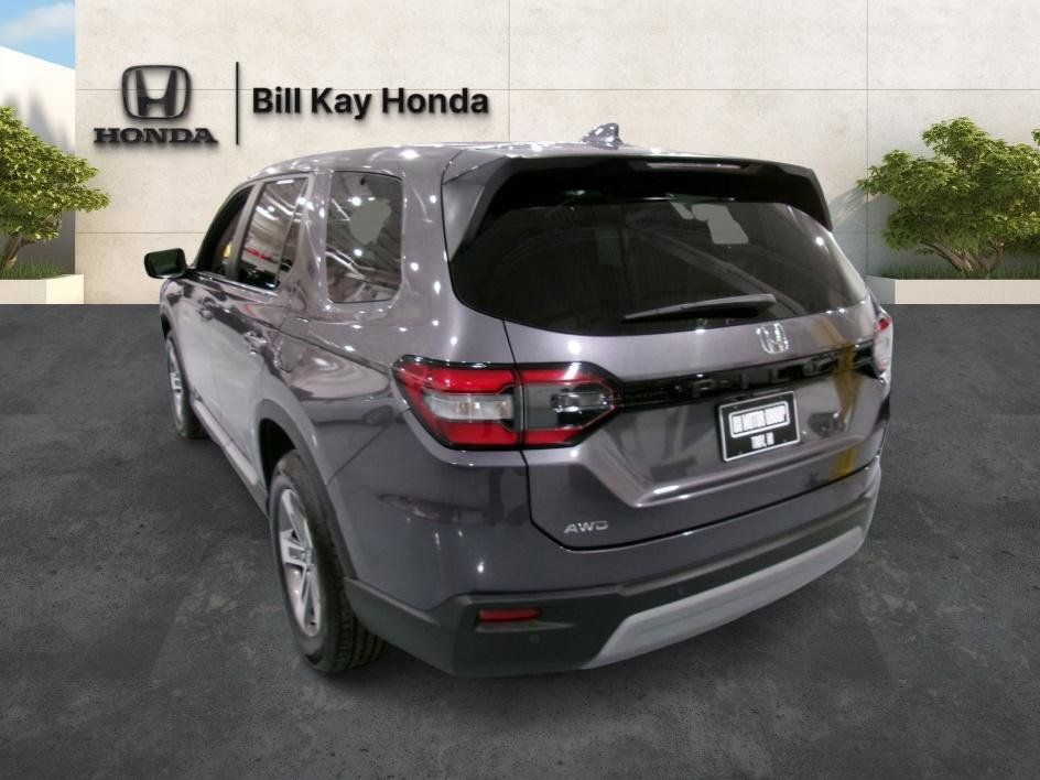 View vehicle photo 3