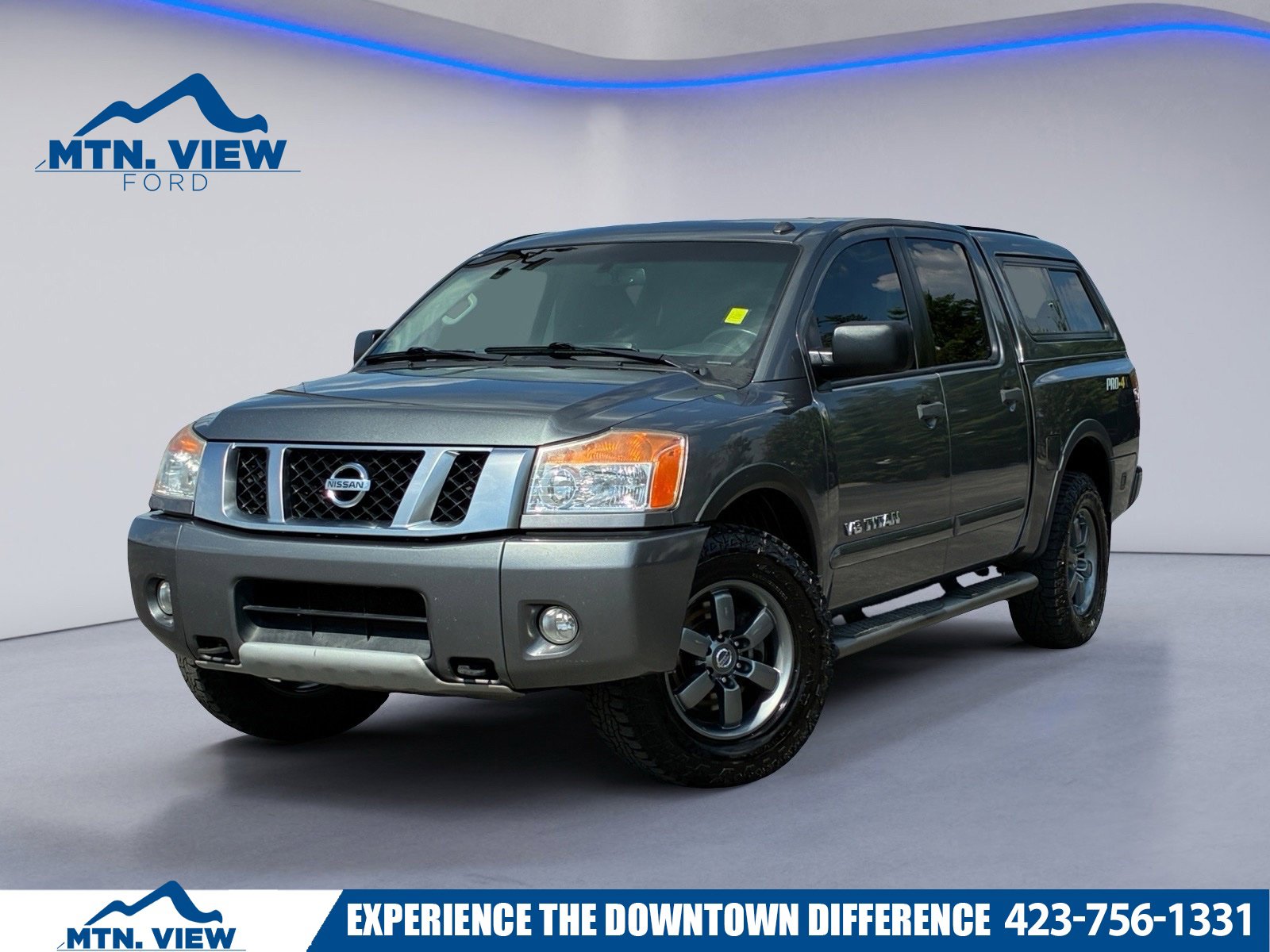 Gray (Gun Metallic) 2014 Nissan Titan Pickup Truck Four-Wheel Drive 5-Speed Automatic