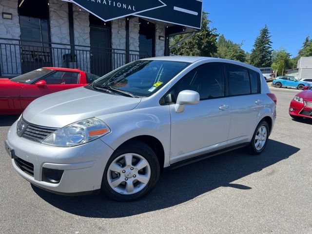 Brilliant Silver Metallic 2009 Nissan Versa Hatchback Front-Wheel Drive Continuously Variable Transmission