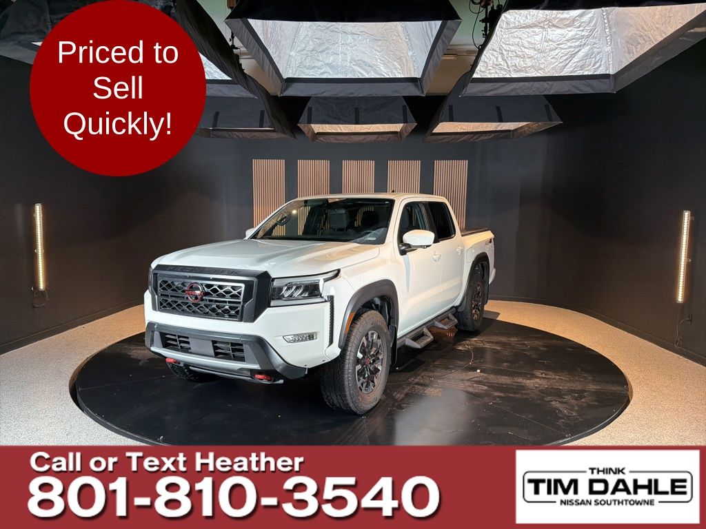 Glacier White 2023 Nissan Frontier Pickup Truck Four-Wheel Drive 9-Speed Automatic