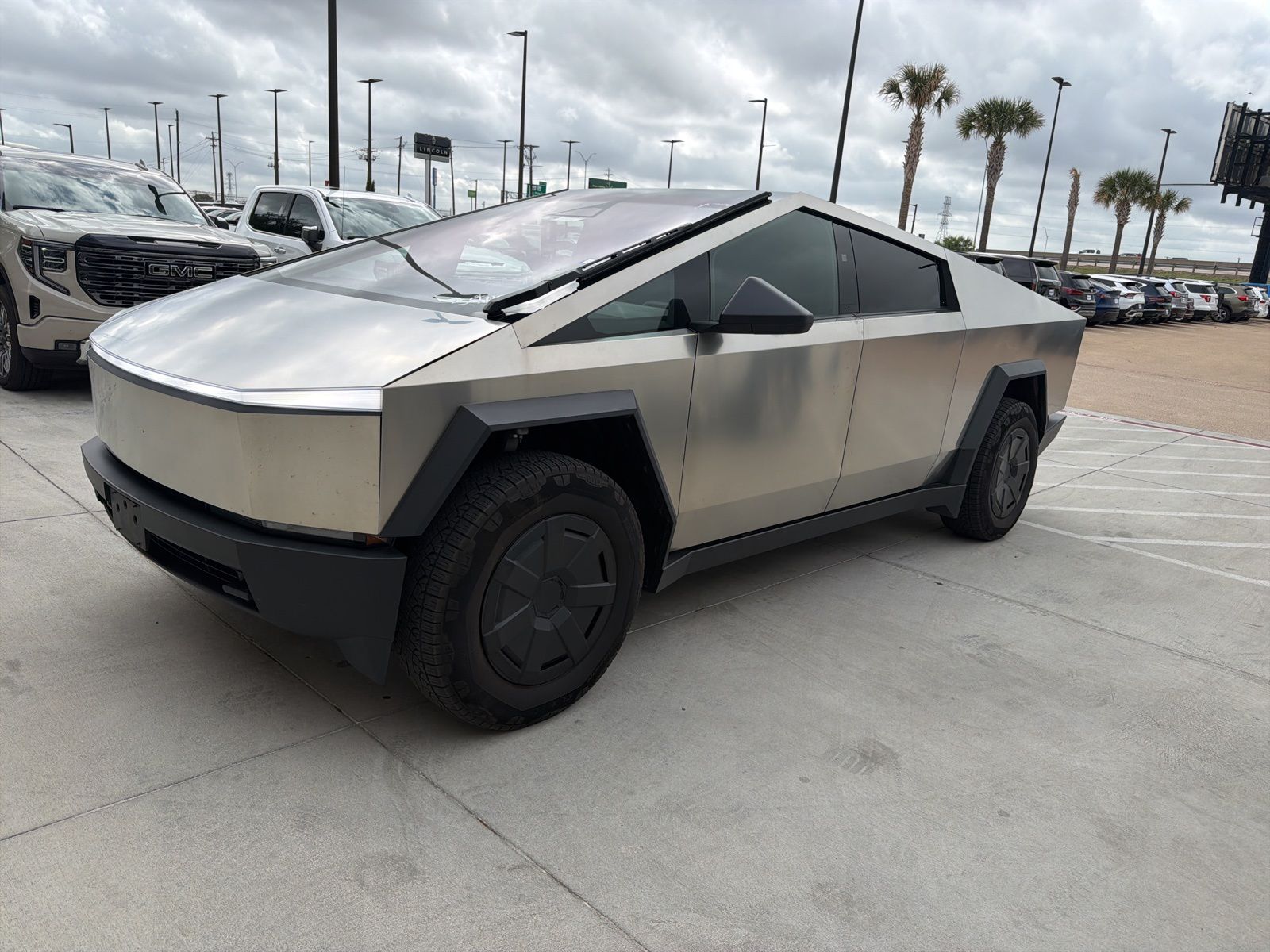 Gray (Ultra-Hard Stainless Steel) 2025 Tesla Cybertruck Crew Cab AWD Pickup Truck All-Wheel Drive 1-Speed Automatic
