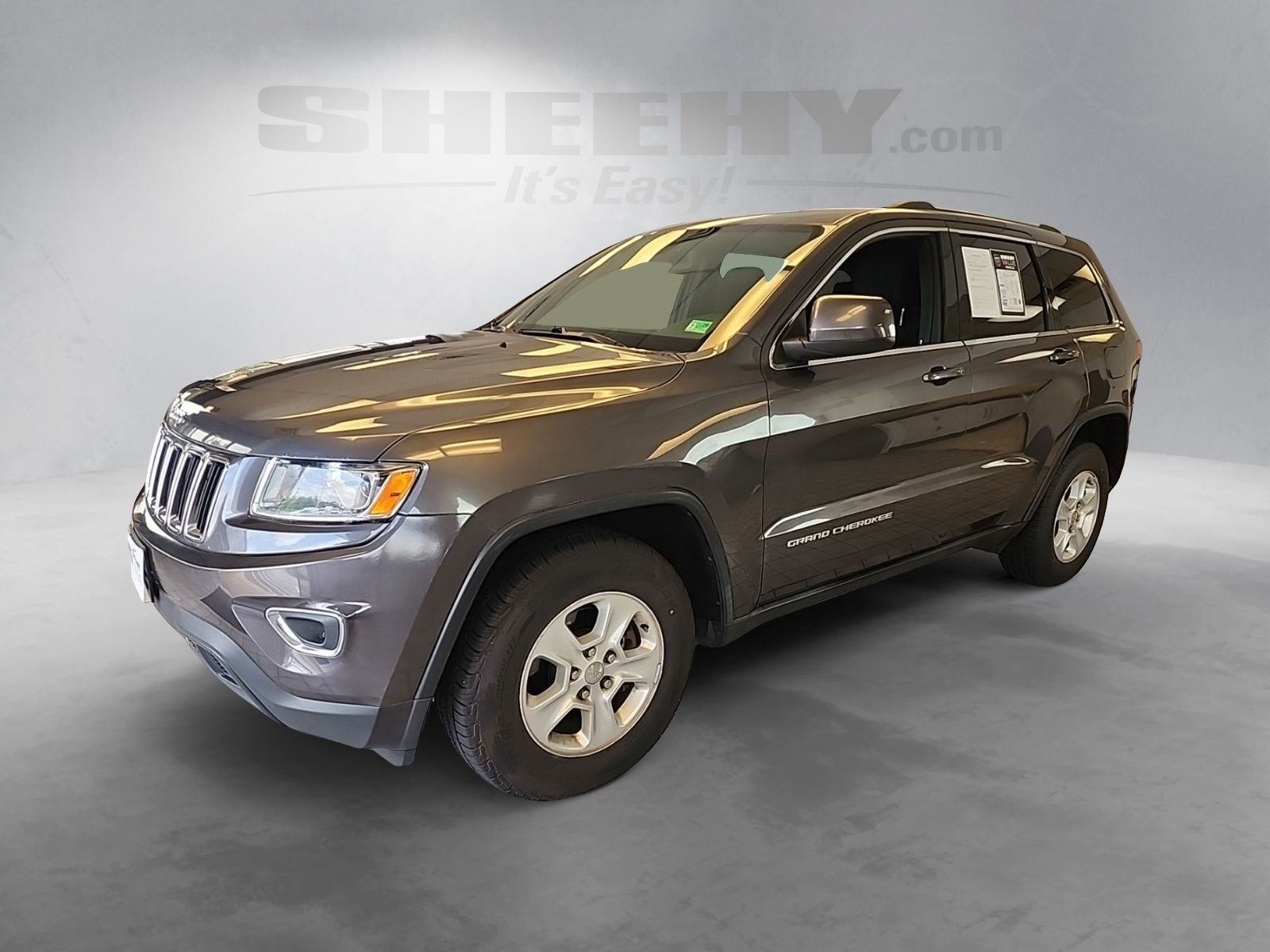 Used 2014 Granite Crystal Clearcoat Metallic Jeep Laredo image 15