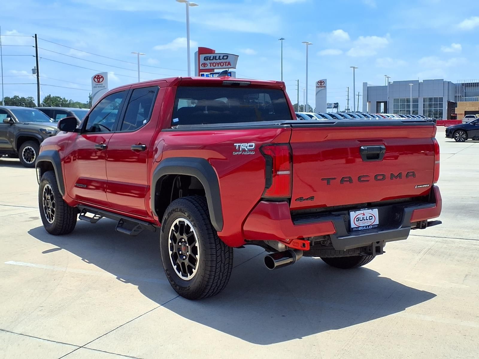 2025 Toyota Tacoma Hybrid TRD Off Road Red at EAG Ford Navasota