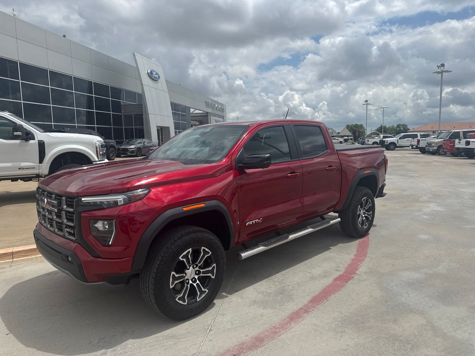 Volcanic Red Tintcoat 2023 GMC Canyon Pickup Truck Four-Wheel Drive 8-Speed Automatic