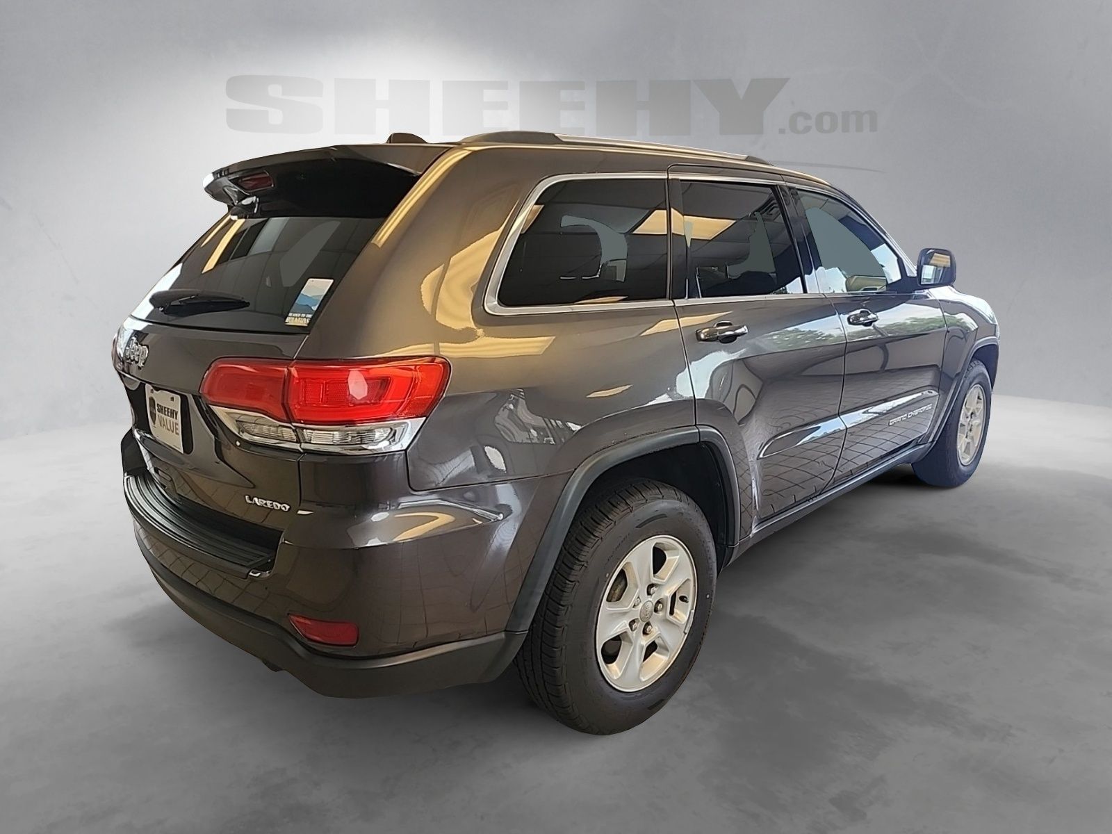 Used 2014 Granite Crystal Clearcoat Metallic Jeep Laredo image 12