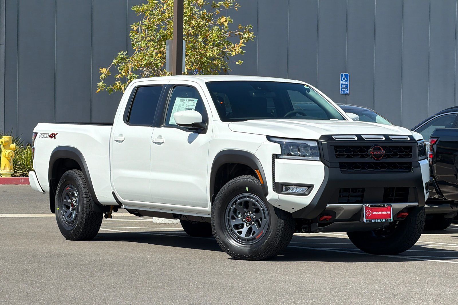 Glacier White 2026 Nissan Frontier Pickup Truck Four-Wheel Drive 9-Speed Automatic Overdrive