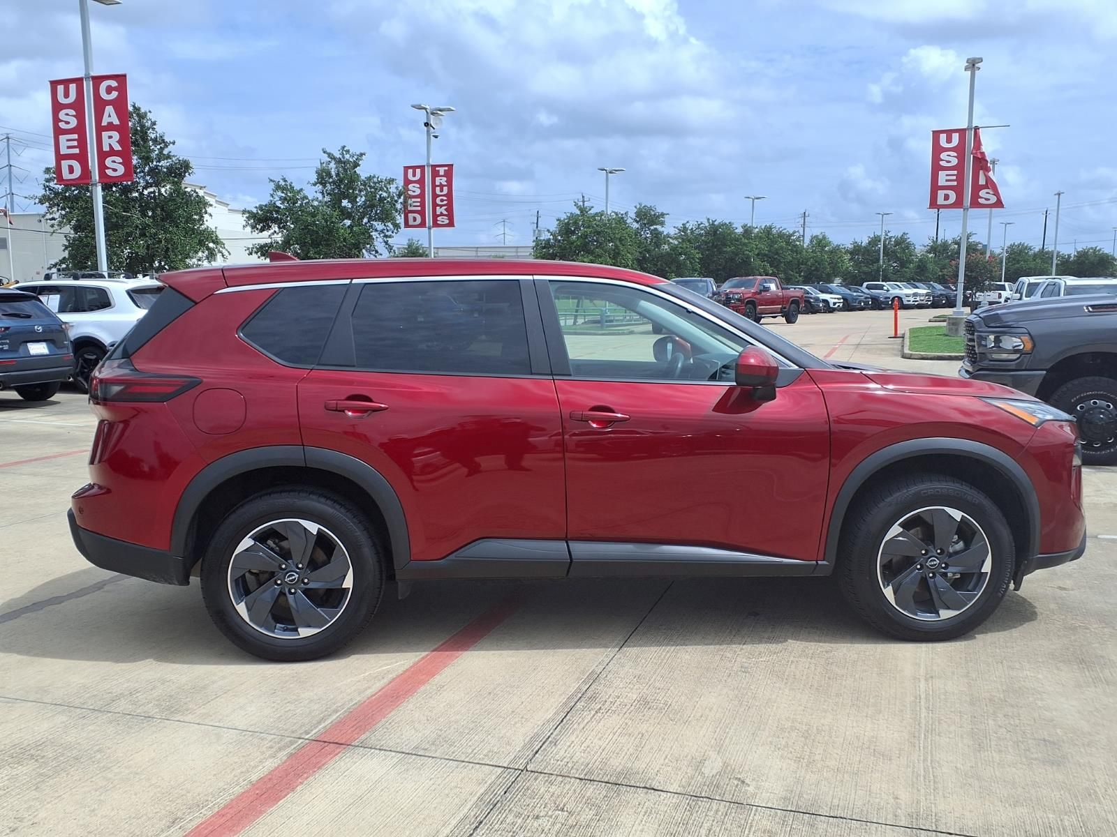 2025 Nissan Rogue SV Red at Central Houston Nissan