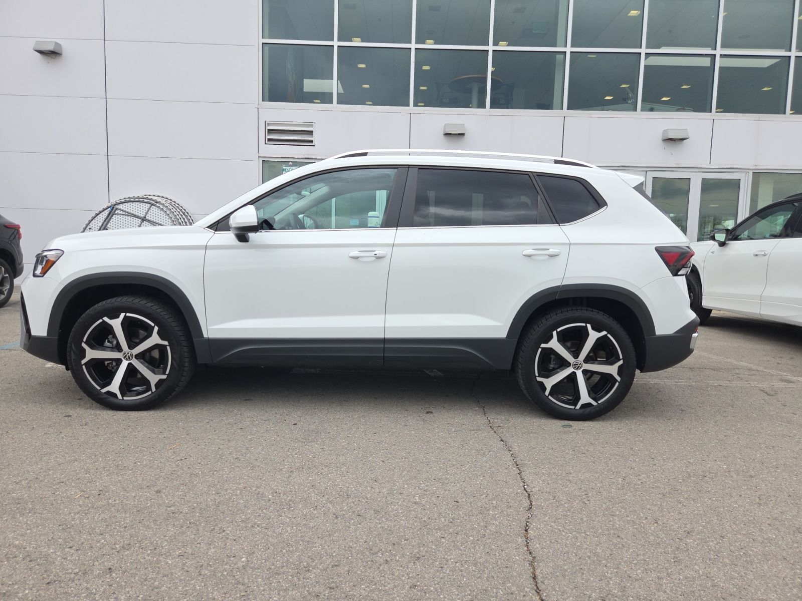 used 2025 Volkswagen Taos car, priced at $29,273