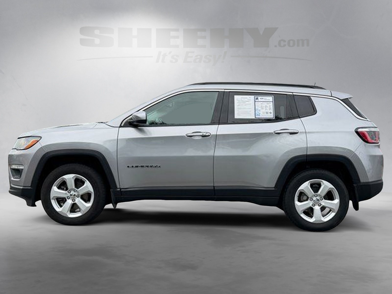 Used 2019 Billet Silver Metallic Jeep Latitude image 16
