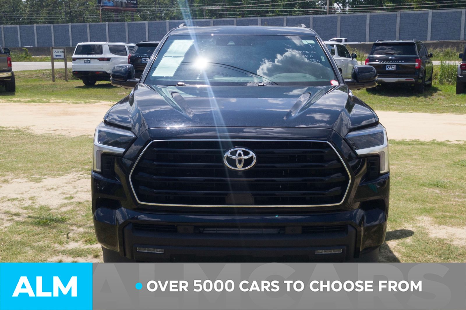 Used 2025 Midnight Black Metallic Toyota SR5 image 2