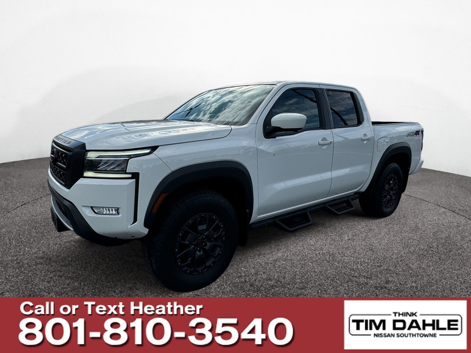 Glacier White 2023 Nissan Frontier Pickup Truck Four-Wheel Drive 9-Speed Automatic