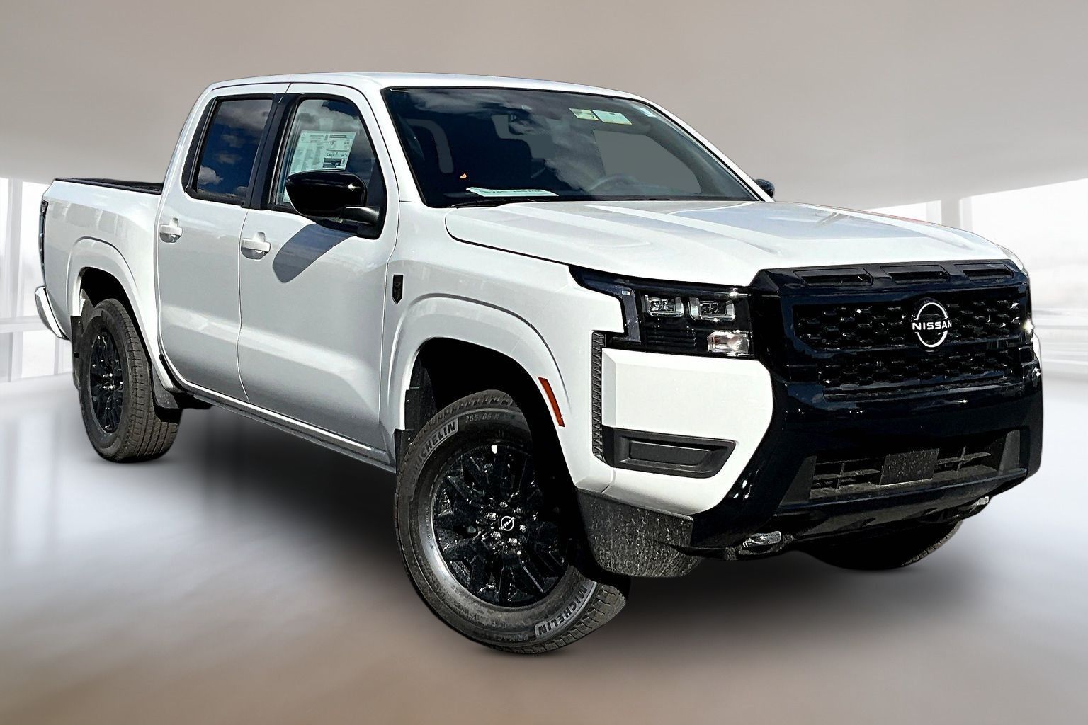 White 2026 Nissan Frontier Pickup Truck Four-Wheel Drive 9-Speed Automatic Overdrive