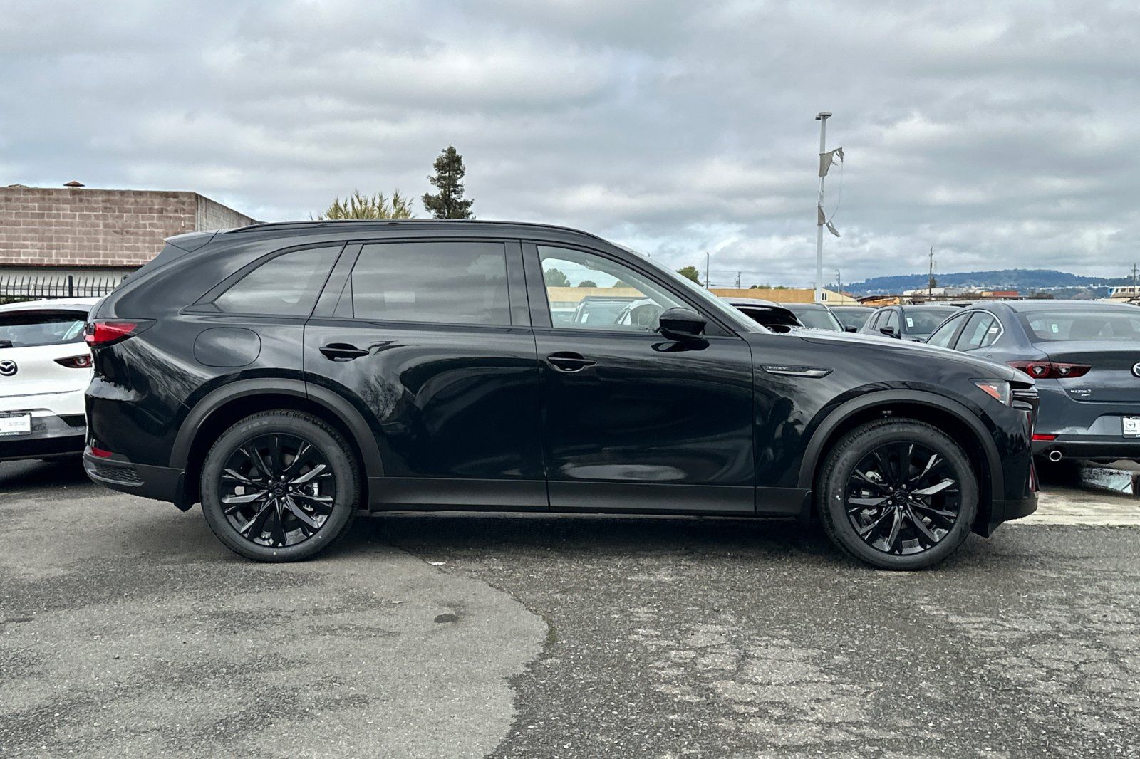 New 2026 Black Mazda Premium image 2