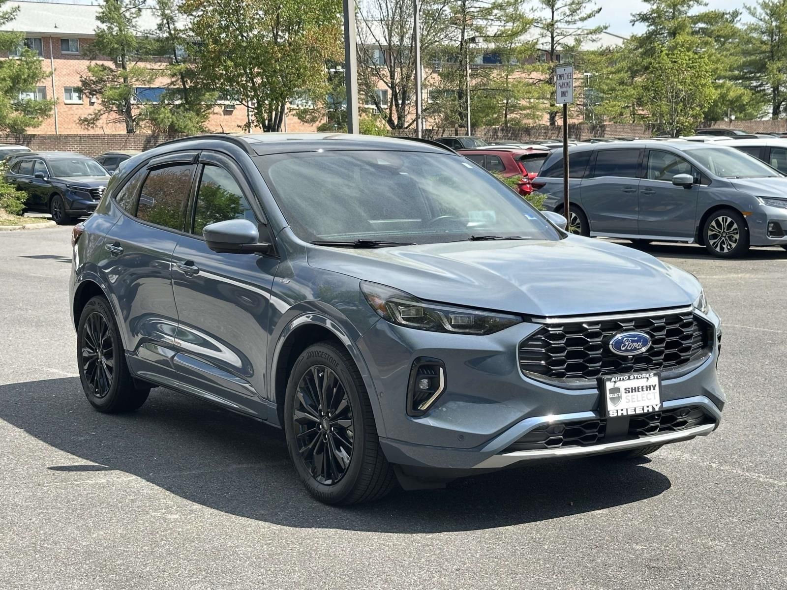 Vapor Blue 2023 Ford Escape Hybrid ST-Line Elite AWD SUV / Crossover All-Wheel Drive Continuously Variable Transmission