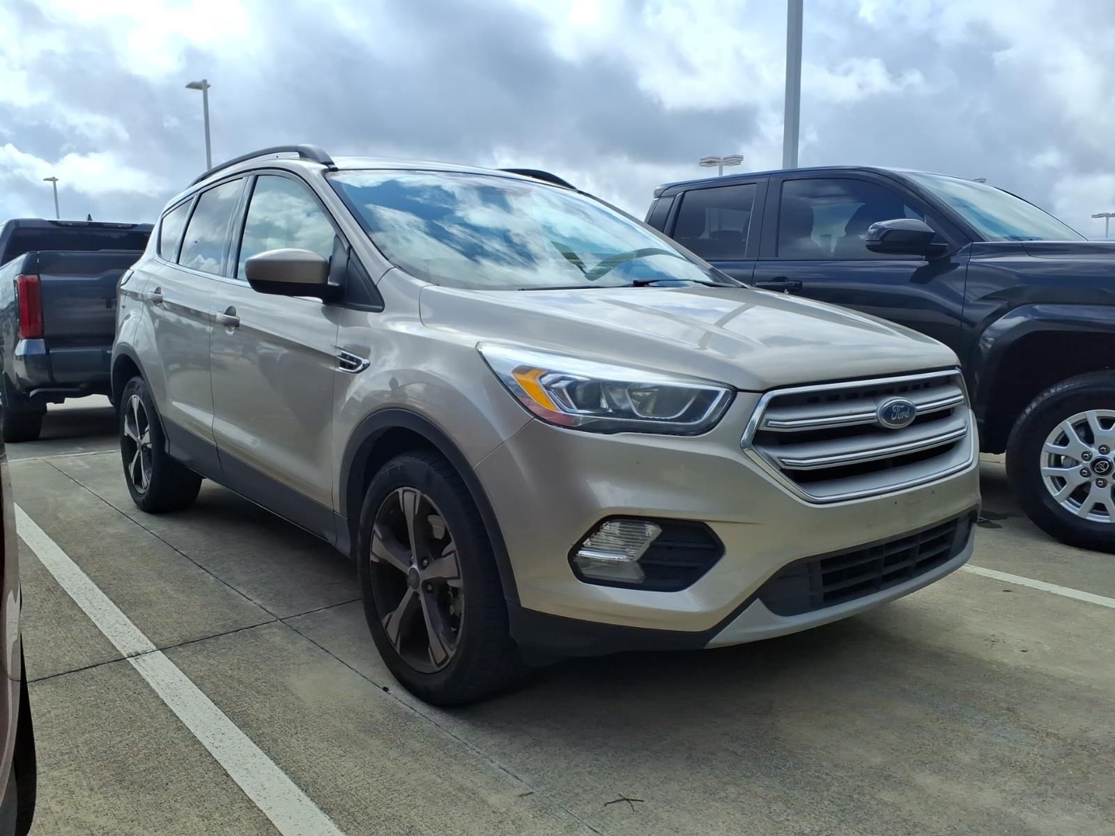 2018 Ford Escape SEL Gold at DeMontrond Auto Country
