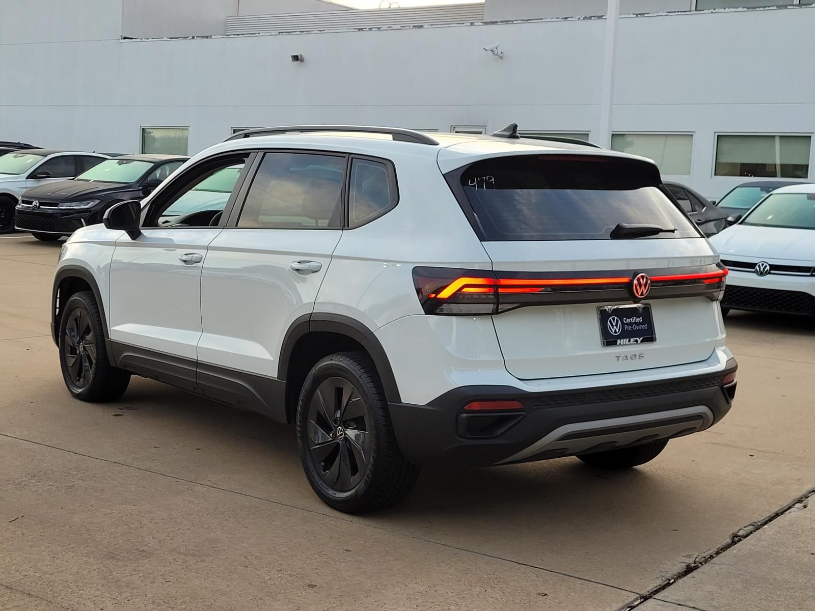 used 2025 Volkswagen Taos car, priced at $23,000