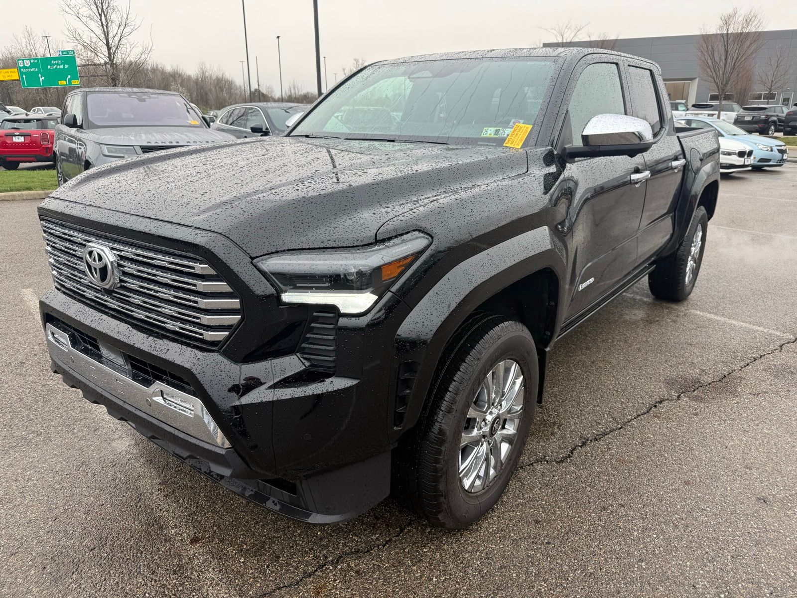 Black 2024 Toyota Tacoma Limited Double Cab 4WD Pickup Truck Four-Wheel Drive 8-Speed Automatic